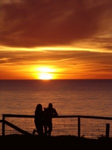 A couple enjoying a beautiful sunset